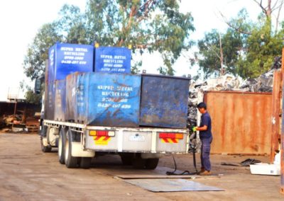 Scrap metal being unloaded in our Dandenong yard by a customer